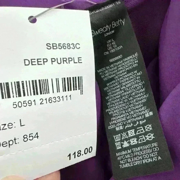 NWT Sweaty Betty.
Power Workout Dress $118 in deep purple/lilac Sz L or XL - Picture 7 of 8